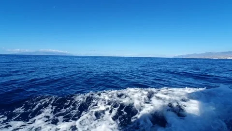 Movement on the ocean waves against the blue sky Stock Footage 252082975