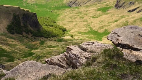 Movement over the gorge of mountains with a view of the forest Stock Footage 109214678