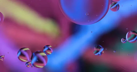 Movement oxygen bubbles in a liquid Stock Footage 127674926