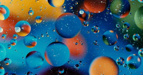 Movement oxygen bubbles in a liquid Stock Footage 129309200