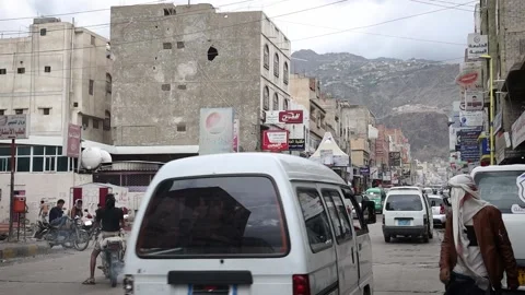 The movement of the people in the Expatriates Street in central Yemen, Taiz Stock Footage 166297341