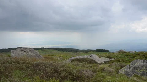 Movement Of Rainy Clouds On a Mountain Stock Footage 61939748