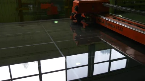 Movement of a Robot, Machine, Process of Cutting of Sheet Glass by Robot, Stock Footage 52875142
