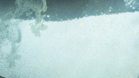 Movement of sparkles in liquid Stock Footage 170718505