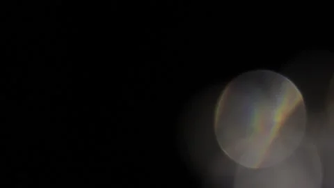 The movement of the sparkling crystal lights on the right flashes. 库存影片 309425626