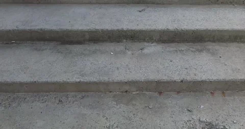 Movement on the steps of a concrete staircase. Stock Footage 265177903