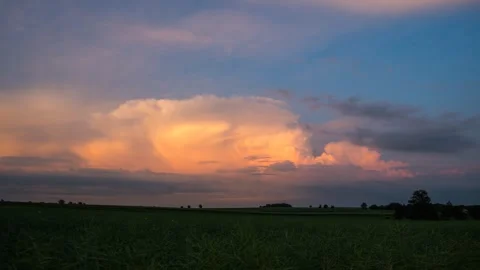 The movement of storm clouds in the light of the setting sun. Stock Footage 301405708