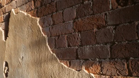 The movement of sunlight on a brick wall. Stock Footage 86696455