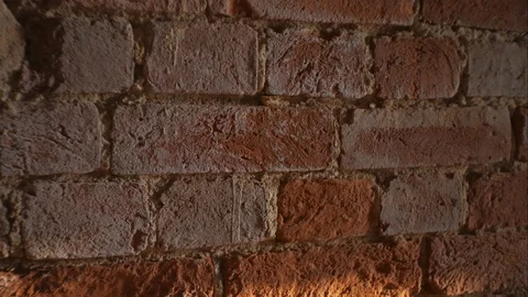 The movement of sunlight on a brick wall. Stock Footage 86699765