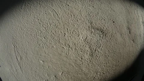 The movement of sunlight on a plastered wall. Stock Footage 168008769