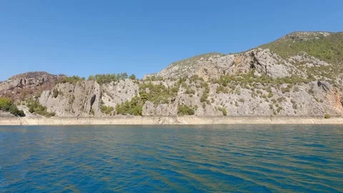 Movement on surface of mountain lake at clear day Stock Footage 245517623