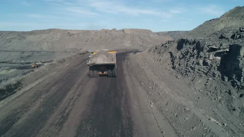 Movement of technological transport along the serpentine around Arctic coal Stock Footage 203919749