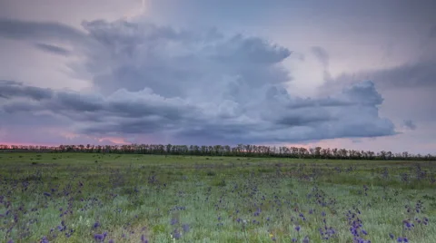 The movement of the thunderclouds over the fields in the vast steppes of the Don Stock Footage 63597474