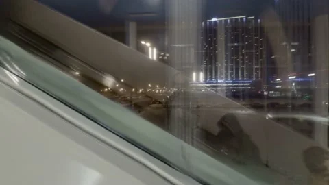 Movement together with the passengers of the train on the overpass, escalator Stock Footage 167909099