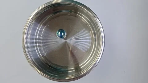 Movement of toy marbles in the can Stock Footage 288963439