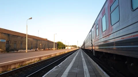 The movement of the train over long distances. Railway train at the station. Stock Footage 114664513