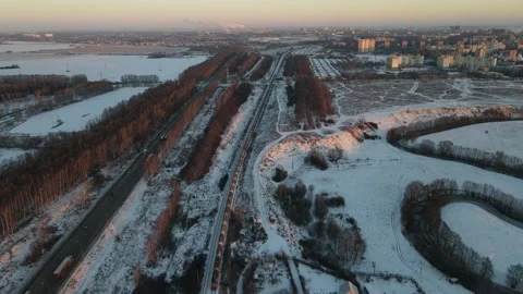 Movement of the train parallel to the expressway Stock Footage 167263952
