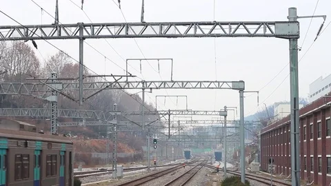 The movement of train to the station in the city. Stock Footage 123322183