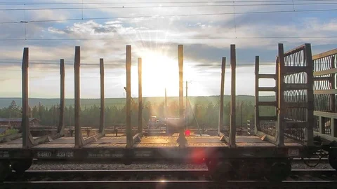 The movement of the train at the station on a summer day at dawn Stock Footage 77915378