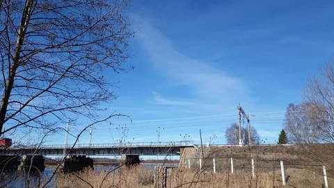The movement of the train through the railway bridge. Railway arch bridge. Stock Footage 106445939