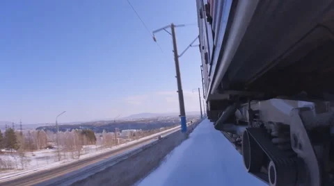 The movement of the train in the winter on the highway Video stock 68804686