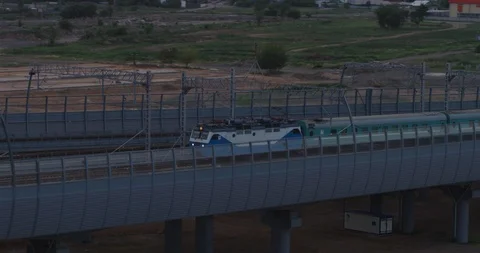 The movement of trains by railways at beautiful sunset. Astana, Kazakhstan. Stock Footage 101896750