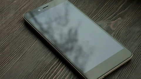 Movement of the trees reflected on the screen  Stock Footage 61847260