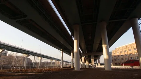 Movement under modern overpasses Stock Footage 73597673