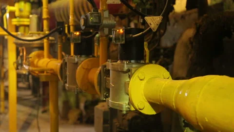 Movement of the video camera along the gas pipes in the boiler room Stock Footage 102901433