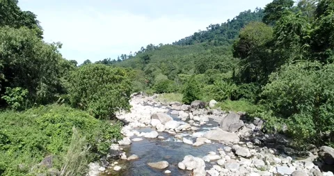 Movement video rocky waterfall in mountain forest Stock Footage 133357257