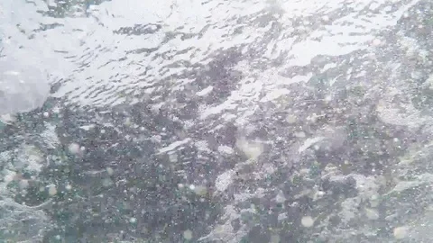 Movement of water with bubbles with highlights Stock Footage 84549871