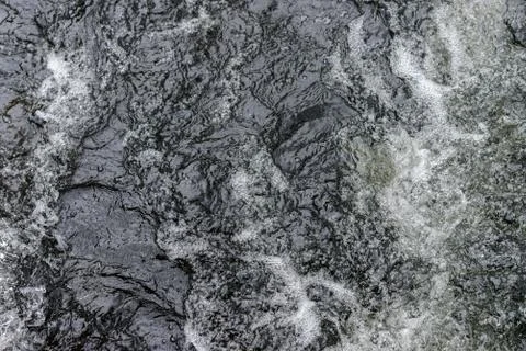 Movement of water surface close-up, background Stock Photos