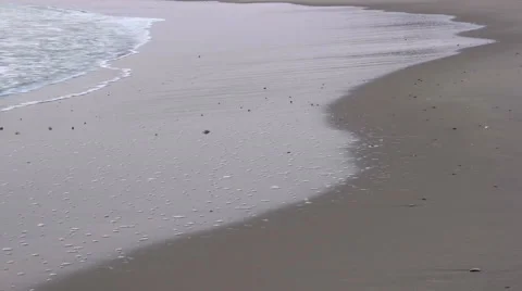 Movement of waves on the beach Stock Footage 53207993