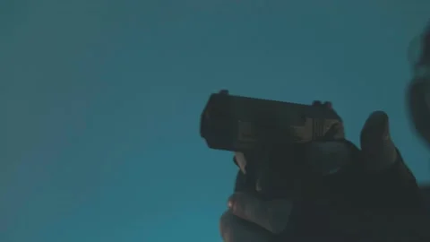 Movement with weapons. Tactics. Aiming. Workout. Blue background. Stock Footage 229314365