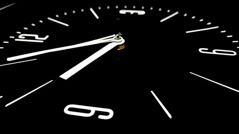 Movements of analog black face clock in real time Stock Footage
