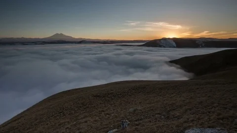 The movements of clouds up to the slopes of the mountains of Caucasus peaks. Stock Footage 70152855