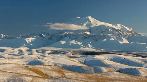 The movements of clouds up to the slopes of the mountains of Caucasus peaks. Stock Footage 70153746