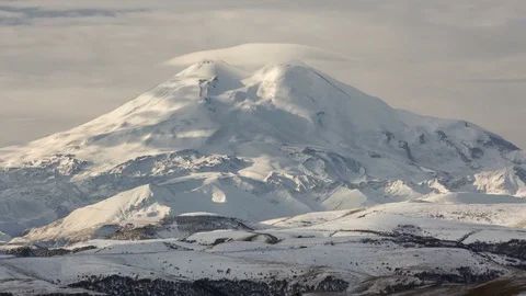 The movements of clouds up to the slopes of the mountains of Caucasus peaks. Video stock 70300396