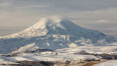 The movements of clouds up to the slopes of the mountains of Caucasus peaks. Stock Footage 70301504