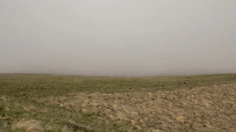 The movements of clouds up to the steep slopes of the  mountains of Caucasus Stock-Footage 63986188