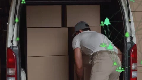 Mover grabbing box, loading van and optimizing load while green net overlay Stock Footage 334202569
