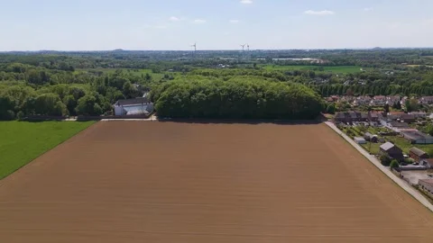 Moves empty fields green trees seneffe town visible right distant windmills add Vidéo 312117221