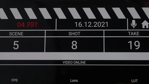 Movie clapper board interface. Digital number running and counting before sho Stock Footage 171100032