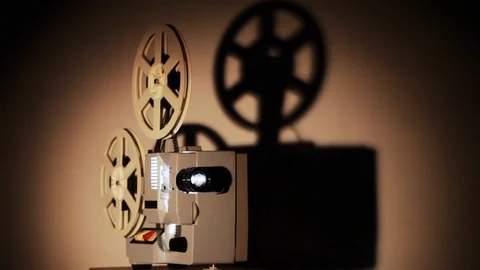 White Film Reels Rotating Oldfashioned 8Mm Movie Projector Playing Bobbin  Tape, Stock Footage