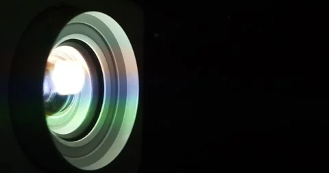 Movie is shown through projector, close-up shot video Stock Footage 310251134