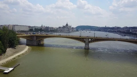 Moving above busy Margit Bridge on the River Danube in Budapest Stock Footage 77109956