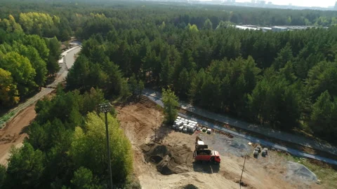 Moving above sandy surface of building facility aerial view Stock Footage 273019244