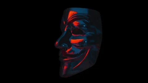 Moving abstract colored patterns are reflected in the mirror mask of Anonymous Stock Footage 313160247