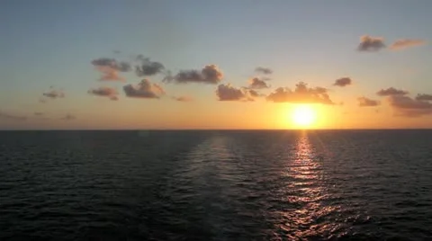 Moving across the Ocean at Sunset Stock Footage 10861144