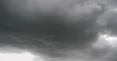 Moving across stormy clouds full of rain ready to downpour Stock Footage 202379258